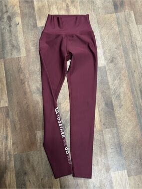 Peloton Burgundy High-Waist Kids Leggings with White Side Text